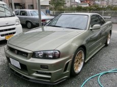 画像1: ■価格応相談　■施工例■　スカイラインＧＴ－Ｒ（ＢＮＲ３４） Ｍスペック Nur 　本革シートの劣化による破れの部分張り替え　福岡市の車内装張替えはオートエージェンシーまで (1)